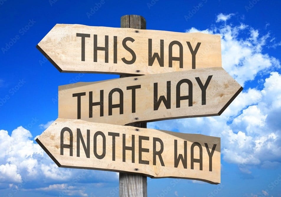 Confusing signpost with arrows labeled 'This Way,' 'That Way,' and 'Another Way,' symbolizing the uncertainty many people face before a professional cleaning appointment