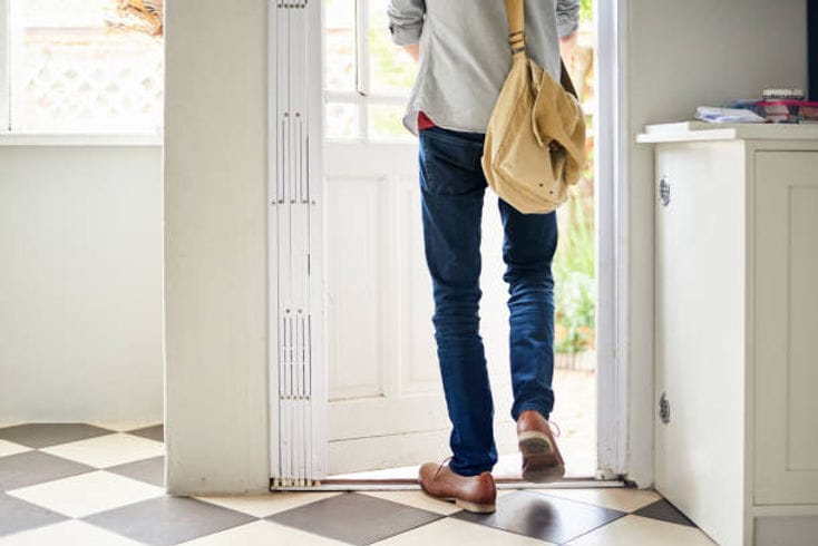 A person who goes out the door